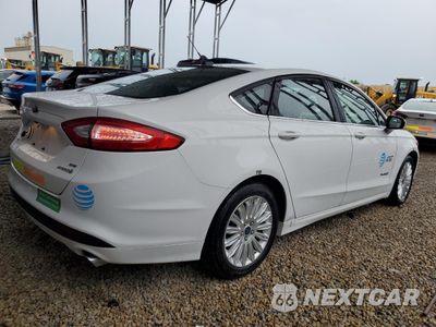 Trzecie zdjęcie samochodu z tyłu: 2016 FORD FUSION SE HYBRID VIN:3FA6P0LU0GR208335 - miniatura