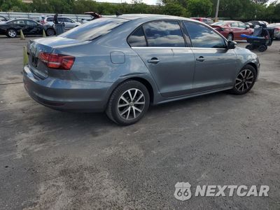 Trzecie zdjęcie samochodu z tyłu: 2017 VOLKSWAGEN JETTA SE VIN:3VWDB7AJ1HM248789 - miniatura