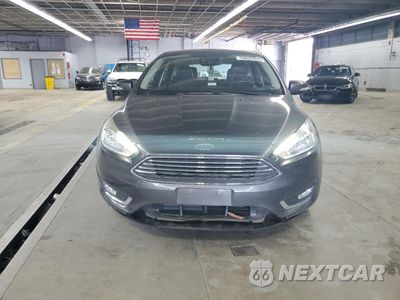 Piąte zdjęcie samochodu w środku: 2017 FORD FOCUS TITANIUM VIN:1FADP3N22HL256987 - miniatura