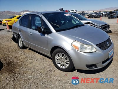 Czwarte zdjęcie samochodu z boku: 2013 SUZUKI SX4 LE VIN:JS2YC5A35D6101897 - miniatura