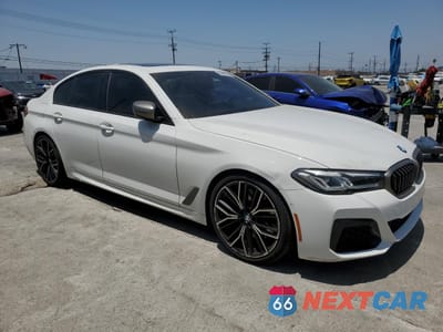 Czwarte zdjęcie samochodu z boku: 2023 BMW M550XI VIN:WBA13BK05PCM72950 - miniatura