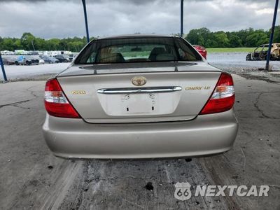 Zdjęcie 6 z 12 samochodu: 2003 TOYOTA CAMRY LE VIN:JTDBE32K630181359 - miniatura