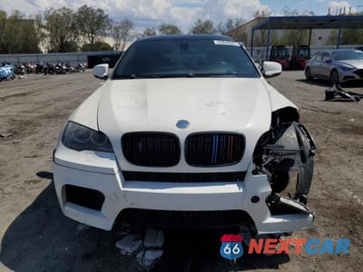 Piąte zdjęcie samochodu w środku: 2011 BMW X6 M VIN:5YMGZ0C55BLK14003 - miniatura