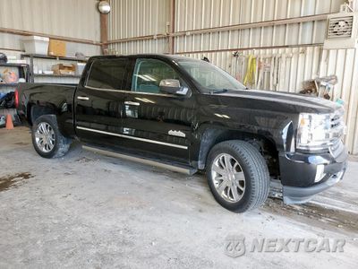 Czwarte zdjęcie samochodu z boku: 2017 CHEVROLET SILVERADO C1500 HIGH COUNTRY VIN:3GCPCTEC1HG339819 - miniatura