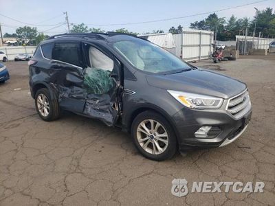 Czwarte zdjęcie samochodu z boku: 2017 FORD ESCAPE SE VIN:1FMCU9GD9HUB94333 - miniatura