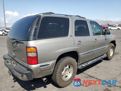 Trzecie zdjęcie samochodu z tyłu: 2002 GMC YUKON VIN:1GKEK13Z62J215805 - miniatura