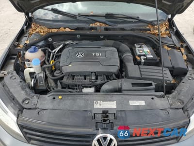 Zdjęcie 11 z 12 samochodu: 2005 VOLKSWAGEN JETTA SE VIN:3VWB07AJ6EM415835 - miniatura