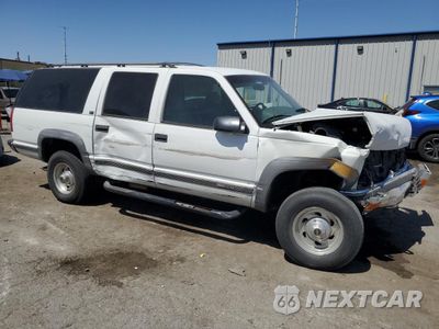Czwarte zdjęcie samochodu z boku: 1996 GMC SUBURBAN K2500 VIN:1GKGK26J0TJ714332 - miniatura