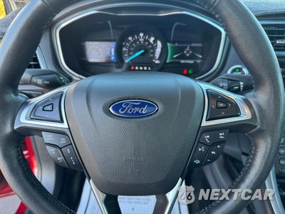 Zdjęcie 8 z 11 samochodu: 2016 FORD FUSION TITANIUM PHEV VIN:3FA6P0SUXGR320707 - miniatura