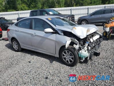 Czwarte zdjęcie samochodu z boku: 2013 HYUNDAI ACCENT GLS VIN:KMHCT4AE6DU530666 - miniatura