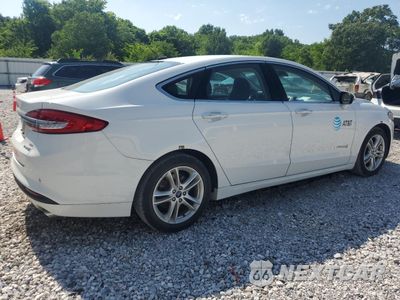 Trzecie zdjęcie samochodu z tyłu: 2018 FORD FUSION SE HYBRID VIN:3FA6P0LUXJR118634 - miniatura