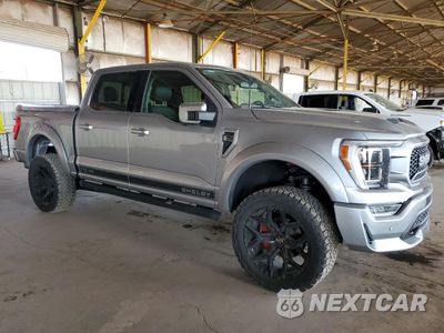 Czwarte zdjęcie samochodu z boku: 2023 FORD F150 SUPERCREW VIN:1FTFW1E54PKF09932 - miniatura