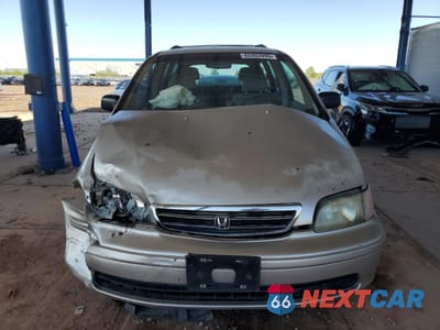 Piąte zdjęcie samochodu w środku: 1998 HONDA ODYSSEY LX VIN:JHMRA3847WC003593 - miniatura
