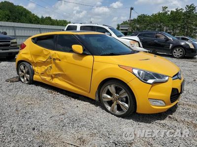Czwarte zdjęcie samochodu z boku: 2015 HYUNDAI VELOSTER BASE VIN:KMHTC6ADXFU244731 - miniatura