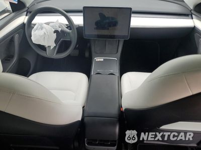 Zdjęcie 8 z 12 samochodu: 2023 TESLA MODEL Y VIN:7SAYGDEE7PA141699 - miniatura
