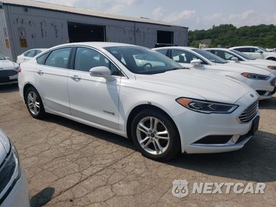 Czwarte zdjęcie samochodu z boku: 2018 FORD FUSION SE HYBRID VIN:3FA6P0LU3JR172101 - miniatura