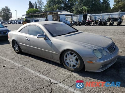 Czwarte zdjęcie samochodu z boku: 2003 MERCEDES-BENZ CL 500 VIN:WDBPJ75J83A036344 - miniatura