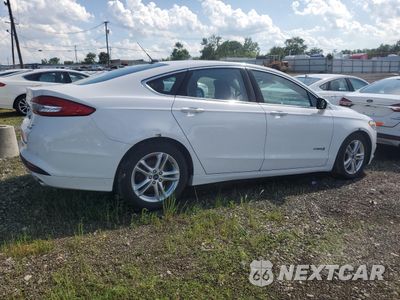 Trzecie zdjęcie samochodu z tyłu: 2018 FORD FUSION SE HYBRID VIN:3FA6P0LU2JR172087 - miniatura