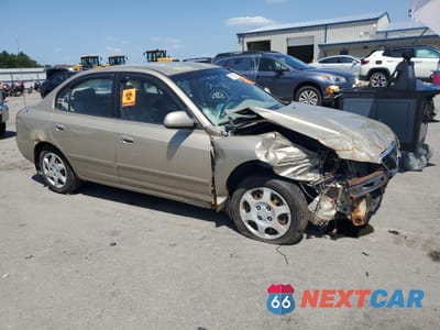 Czwarte zdjęcie samochodu z boku: 2003 HYUNDAI ELANTRA GLS VIN:KMHDN45D23U642542 - miniatura