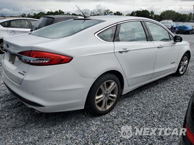 Trzecie zdjęcie samochodu z tyłu: 2018 FORD FUSION SE HYBRID VIN:3FA6P0LU8JR163507 - miniatura