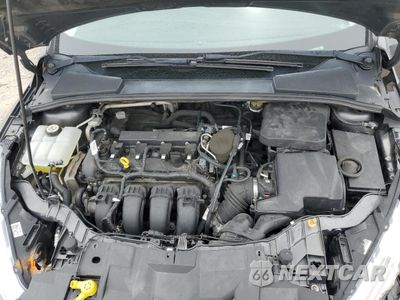 Zdjęcie 11 z 15 samochodu: 2015 FORD FOCUS TITANIUM VIN:1FADP3J27FL259029 - miniatura