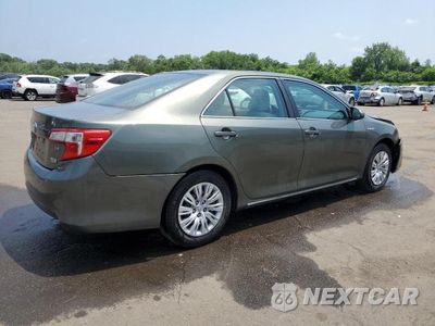 Trzecie zdjęcie samochodu z tyłu: 2014 TOYOTA CAMRY HYBRID VIN:4T1BD1FK0EU124230 - miniatura
