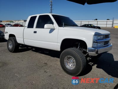 Czwarte zdjęcie samochodu z boku: 1996 GMC SIERRA K1500 VIN:2GTEK19R0T1509019 - miniatura