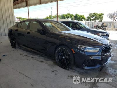 Czwarte zdjęcie samochodu z boku: 2022 BMW M850XI VIN:WBAGV8C09NCJ65896 - miniatura