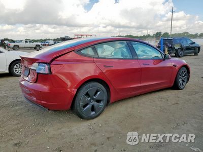 Trzecie zdjęcie samochodu z tyłu: 2022 TESLA MODEL 3 VIN:5YJ3E1EA0NF326833 - miniatura