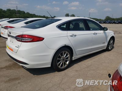 Trzecie zdjęcie samochodu z tyłu: 2017 FORD FUSION SE HYBRID VIN:3FA6P0LU7HR409084 - miniatura