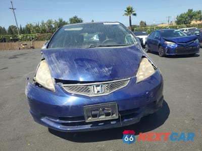 Piąte zdjęcie samochodu w środku: 2011 HONDA FIT VIN:JHMGE8G36BC020879 - miniatura