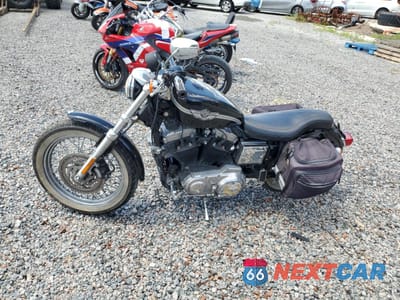 Trzecie zdjęcie samochodu z tyłu: 2003 HARLEY-DAVIDSON XL883 HUGGER VIN:1HD4CEM143K447527 - miniatura