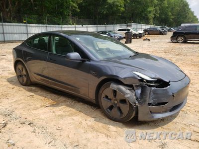 Czwarte zdjęcie samochodu z boku: 2022 TESLA MODEL 3 VIN:5YJ3E1EB1NF290336 - miniatura