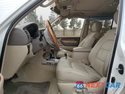 Zdjęcie 7 z 13 samochodu: 2003 LEXUS LX 470 VIN:JTJHT00WX33534413 - miniatura