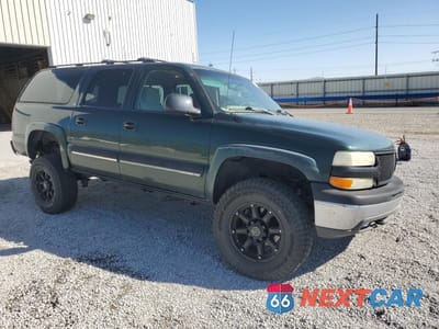 Czwarte zdjęcie samochodu z boku: 2001 CHEVROLET SUBURBAN K2500 VIN:3GNGK26G91G1Y4912 - miniatura