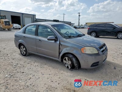 Czwarte zdjęcie samochodu z boku: 2010 CHEVROLET AVEO LS VIN:KL1TD5DE1AB130662 - miniatura