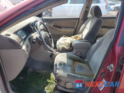 Zdjęcie 7 z 12 samochodu: 2003 TOYOTA COROLLA CE VIN:1NXBR32E43Z161596 - miniatura