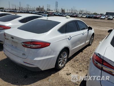 Trzecie zdjęcie samochodu z tyłu: 2020 FORD FUSION SE VIN:3FA6P0LU1LR119075 - miniatura