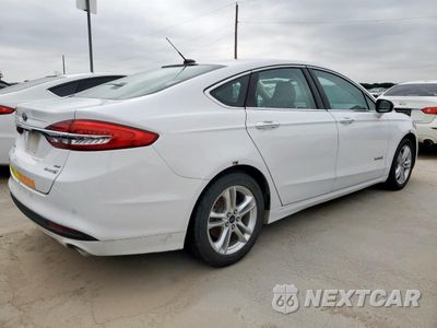 Trzecie zdjęcie samochodu z tyłu: 2018 FORD FUSION SE HYBRID VIN:3FA6P0LUXJR171883 - miniatura