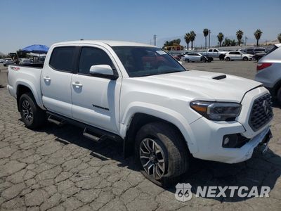 Czwarte zdjęcie samochodu z boku: 2023 TOYOTA TACOMA DOUBLE CAB VIN:3TMCZ5ANXPM640220 - miniatura