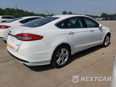Trzecie zdjęcie samochodu z tyłu: 2018 FORD FUSION SE HYBRID VIN:3FA6P0LUXJR118715 - miniatura