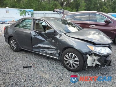 Czwarte zdjęcie samochodu z boku: 2014 TOYOTA CAMRY HYBRID VIN:4T1BD1FK3EU125081 - miniatura