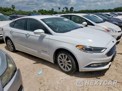 Czwarte zdjęcie samochodu z boku: 2017 FORD FUSION SE HYBRID VIN:3FA6P0LU6HR409058 - miniatura