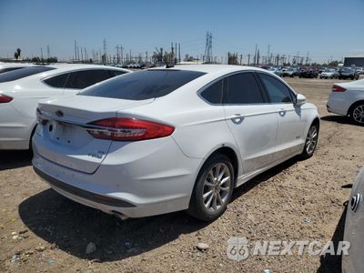 Trzecie zdjęcie samochodu z tyłu: 2017 FORD FUSION SE HYBRID VIN:3FA6P0LU7HR409134 - miniatura