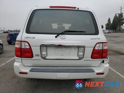 Zdjęcie 6 z 13 samochodu: 2003 LEXUS LX 470 VIN:JTJHT00WX33534413 - miniatura