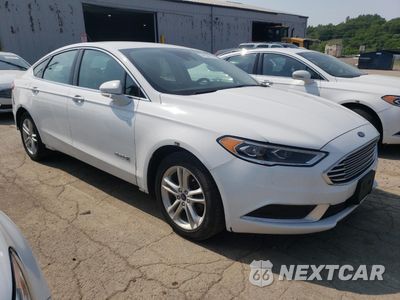 Czwarte zdjęcie samochodu z boku: 2018 FORD FUSION SE HYBRID VIN:3FA6P0LUXJR118715 - miniatura