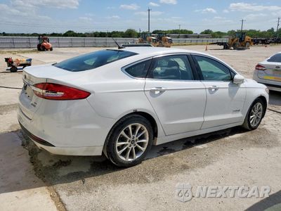 Trzecie zdjęcie samochodu z tyłu: 2017 FORD FUSION SE HYBRID VIN:3FA6P0LU9HR359675 - miniatura