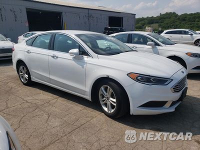 Czwarte zdjęcie samochodu z boku: 2018 FORD FUSION SE HYBRID VIN:3FA6P0LU6JR118744 - miniatura