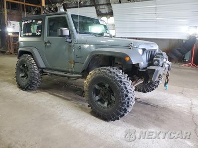 Czwarte zdjęcie samochodu z boku: 2014 JEEP WRANGLER SPORT VIN:1C4AJWAG9EL192623 - miniatura