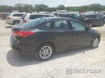 Trzecie zdjęcie samochodu z tyłu: 2018 FORD FOCUS VIN:1FADP3FE3JL210938 - miniatura